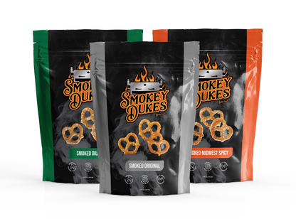 Six bags of Smokey Dukes pretzels, 2 bags of each of our current flavors: original (x2), Midwest spicy (x2), and dill (x2).